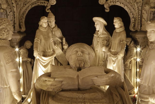 Sant'Agostino legge sul letto di morte