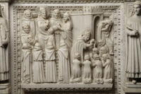 Agostino ammaestra (a sinistra) e battezza i giovani (a destra); un eretico si rifiuta di vedere
